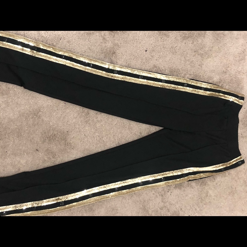 Black Pullaway joggers with gold sequin stripes